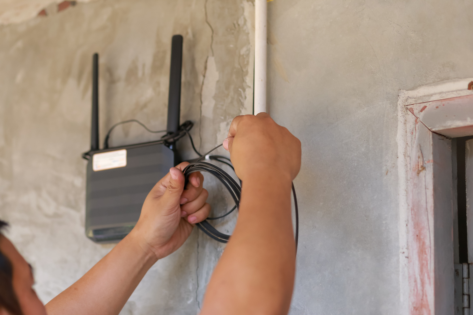 Technicians Are Installing Wi-Fi and Fiber Optic Cables.